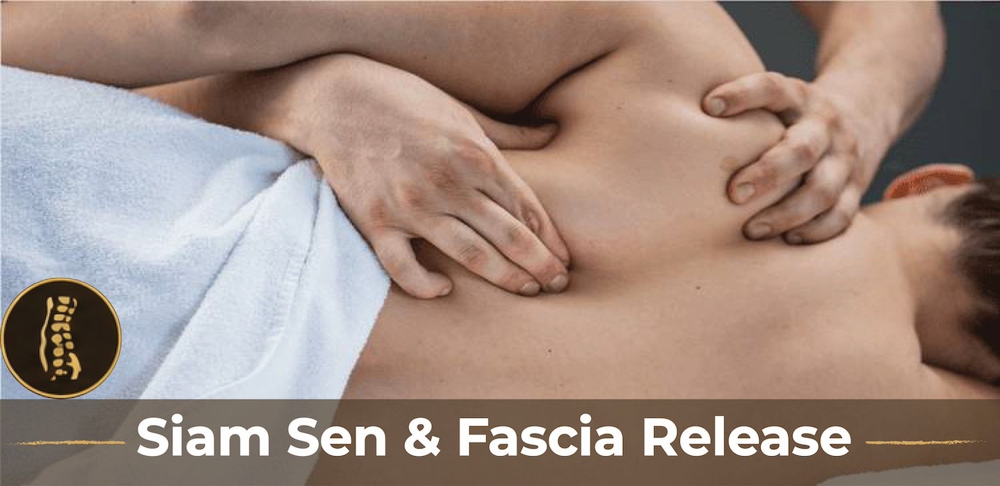 Therapist performing Siam Sen and fascia release massage using herbal compress and gua sha at Chi Wa Siam Day Spa